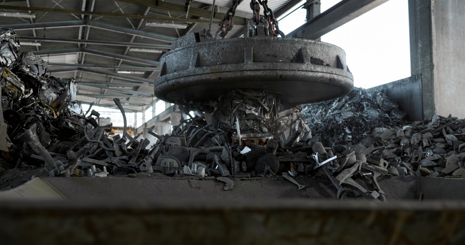 Magnet processing ferrous scrap at the facility